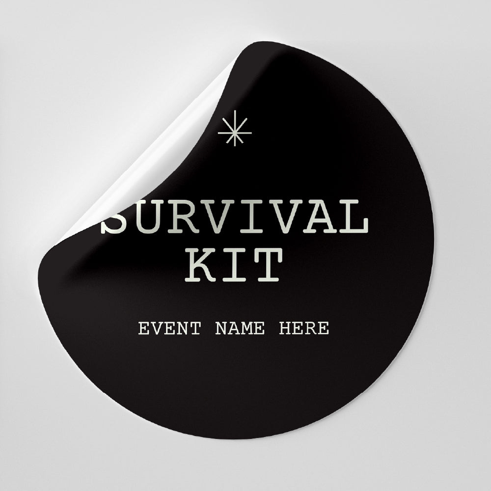 Black survival kit label with customizable event name on a gray background