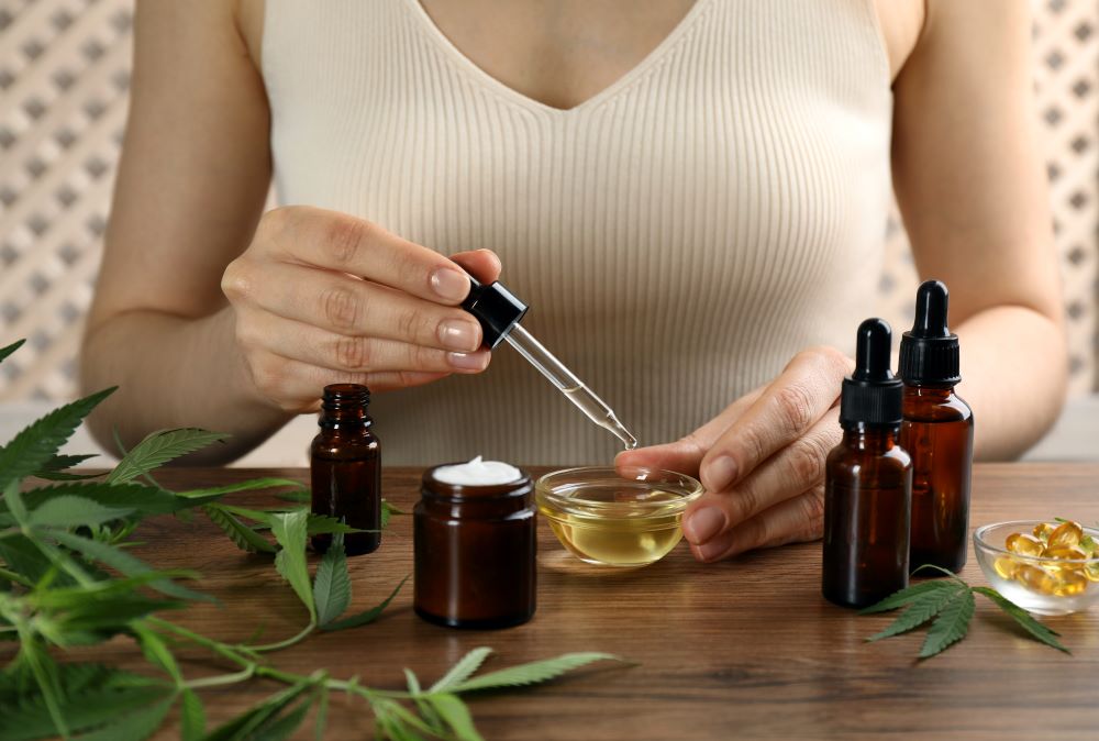 a woman wondering how CBD oil works in the body